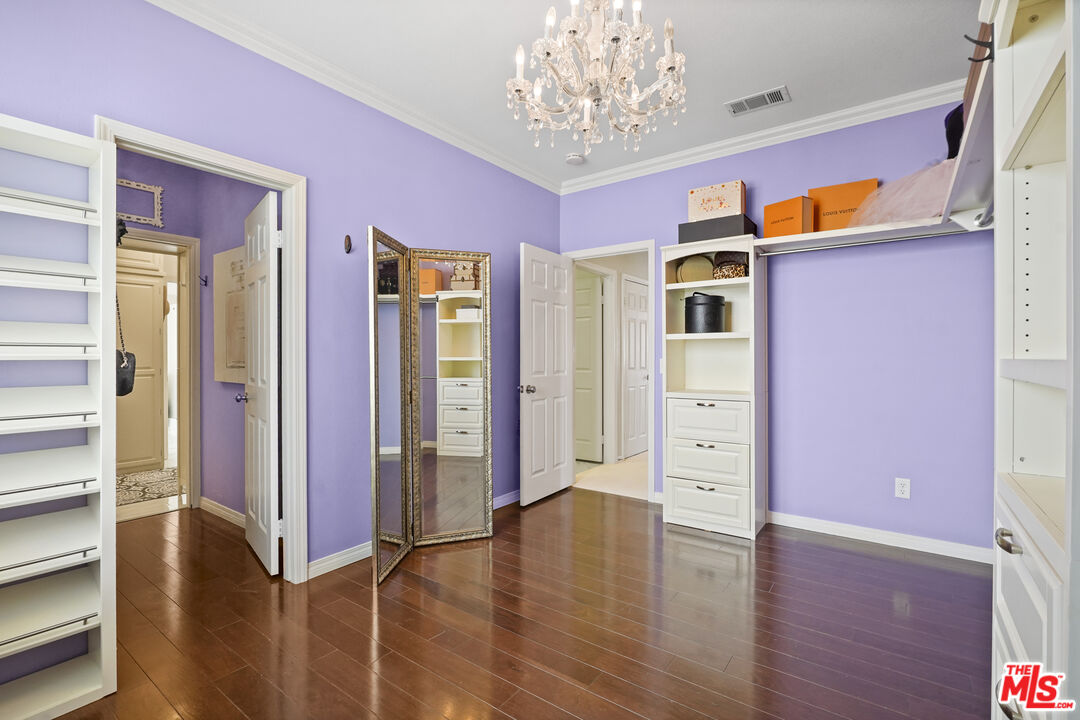 23871 Rio Ranch Way Valencia, CA 91354 - Photo 21 of 46 wooden floor with an empty room
