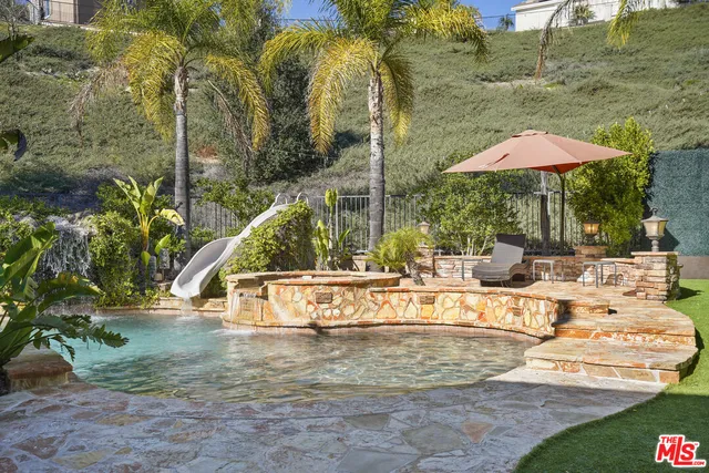 a view of a garden with a slide