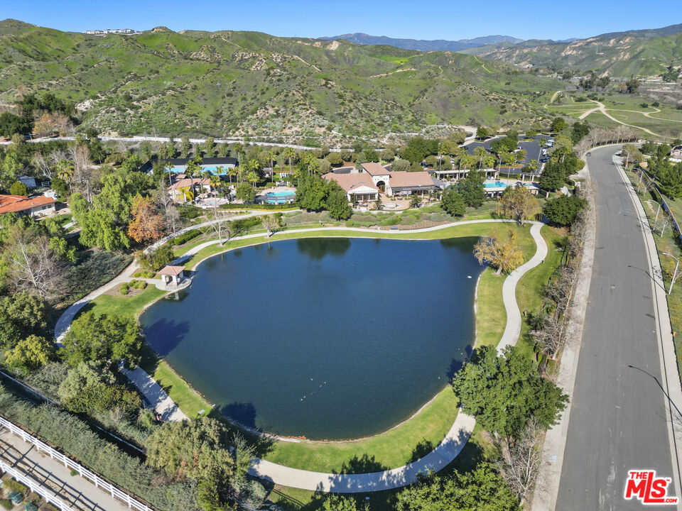 23871 Rio Ranch Way Valencia, CA 91354 - Photo 40 of 46 an aerial view of residential houses with outdoor space and trees