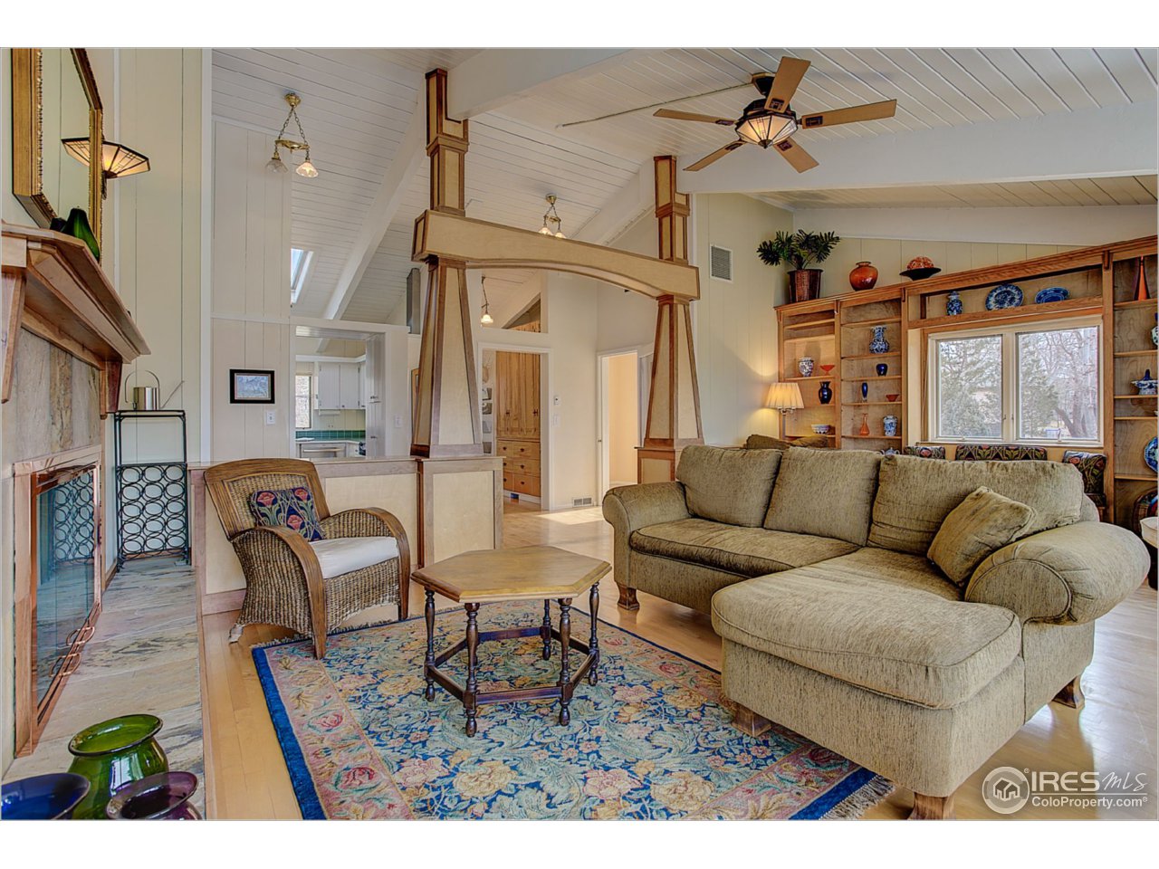 1498 Marshall Road Boulder, CO 80305 - Photo 13 of 40 a living room with furniture and a chandelier