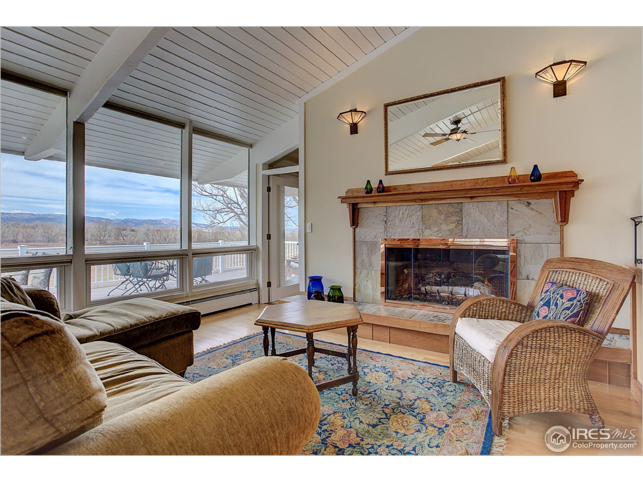 1498 Marshall Road Boulder, CO 80305 - Photo 14 of 40 a living room with furniture and a fireplace