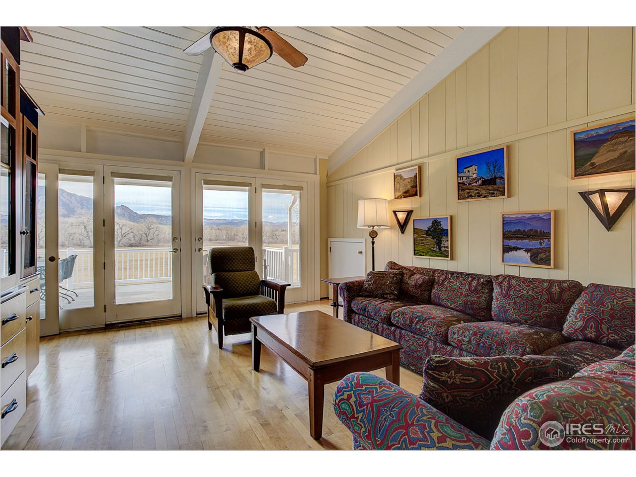 1498 Marshall Road Boulder, CO 80305 - Photo 16 of 40 a living room with furniture and a flat screen tv