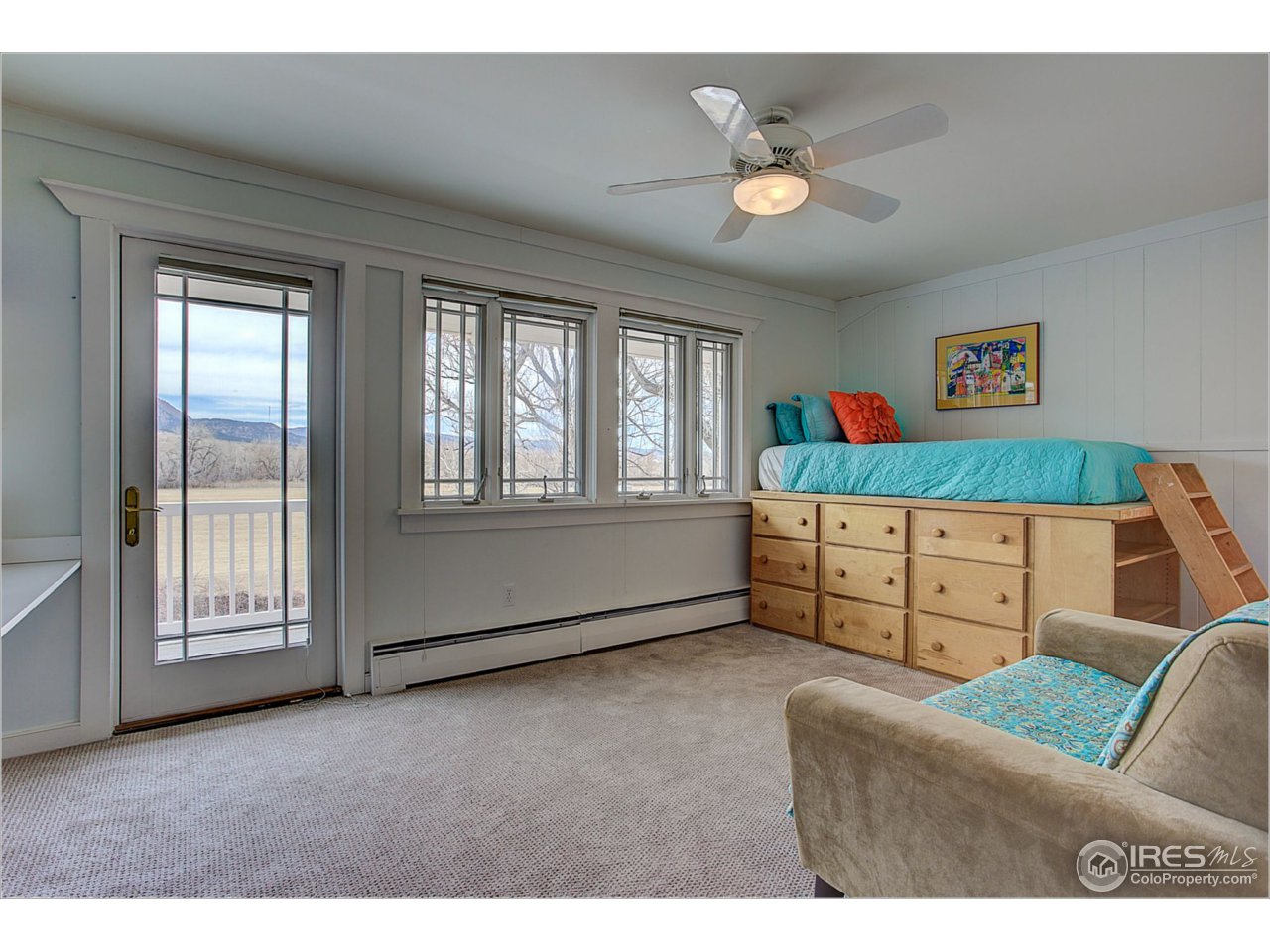 1498 Marshall Road Boulder, CO 80305 - Photo 21 of 40 a living room with furniture and a window