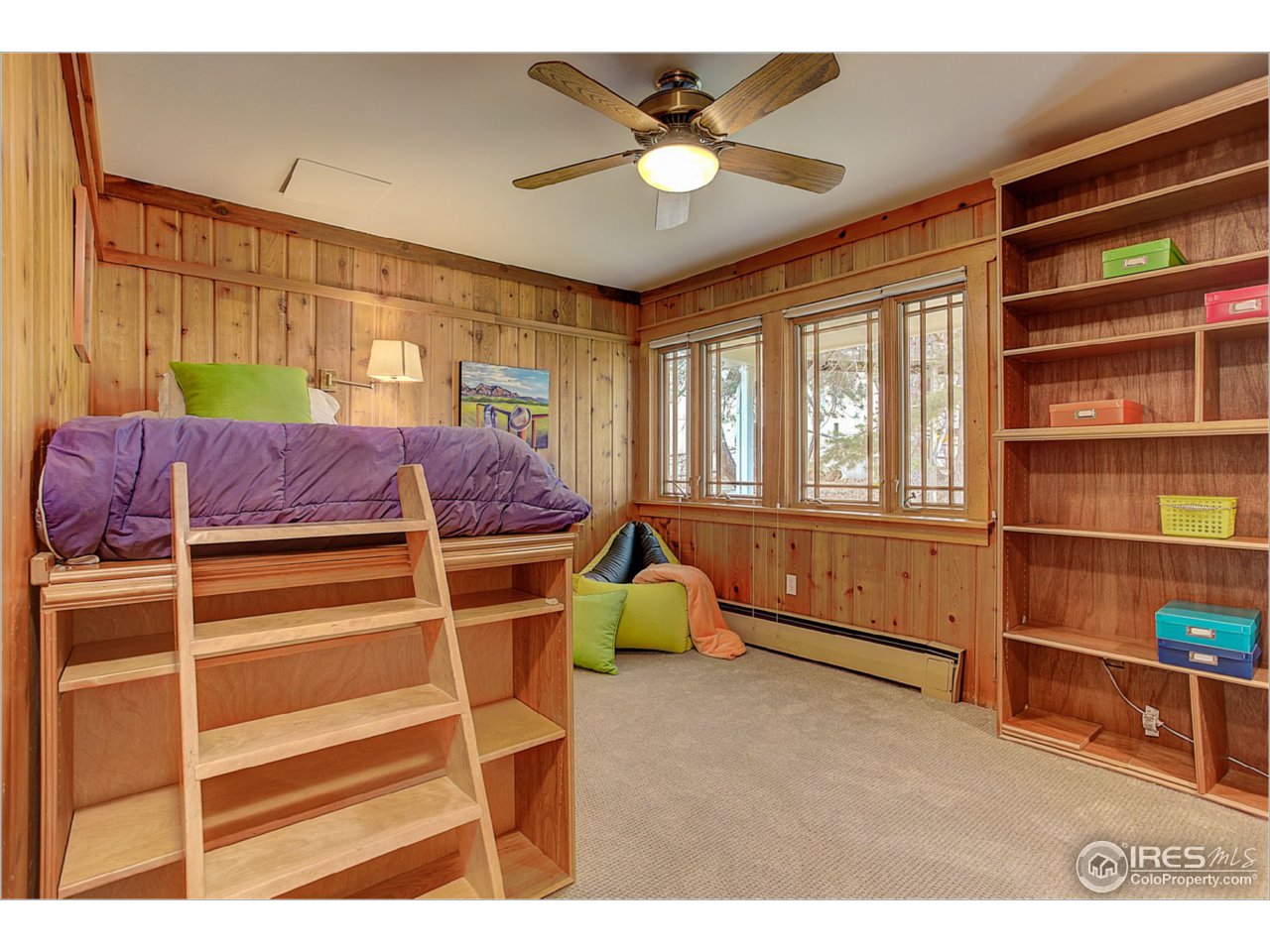 1498 Marshall Road Boulder, CO 80305 - Photo 23 of 40 a bed room with a bed and a window