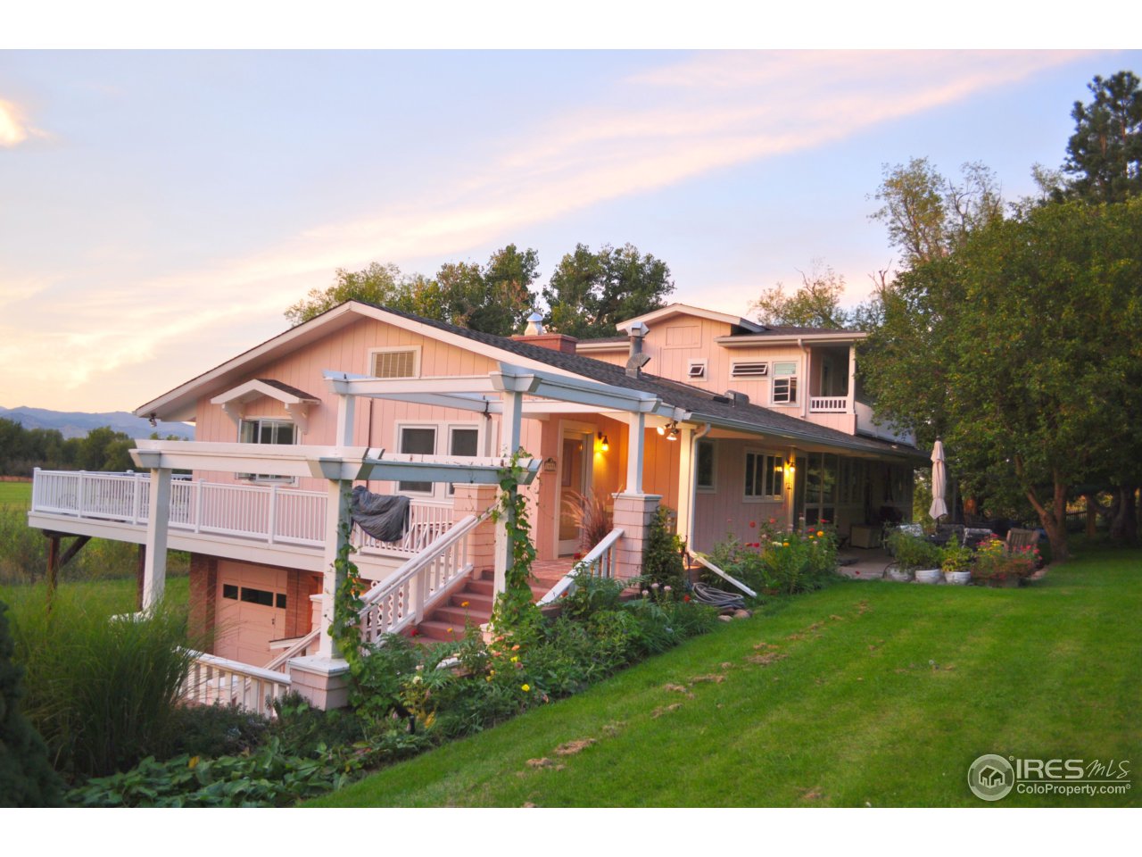 1498 Marshall Road Boulder, CO 80305 - Photo 5 of 40 a front view of a house with garden