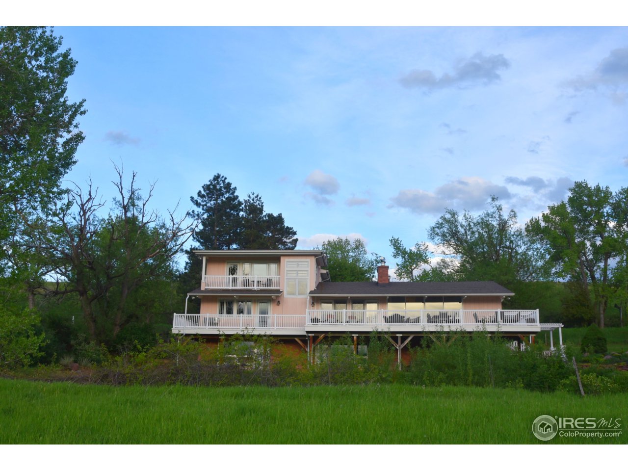 1498 Marshall Road Boulder, CO 80305 - Photo 7 of 40 a view of a big yard with a large tree and a yard