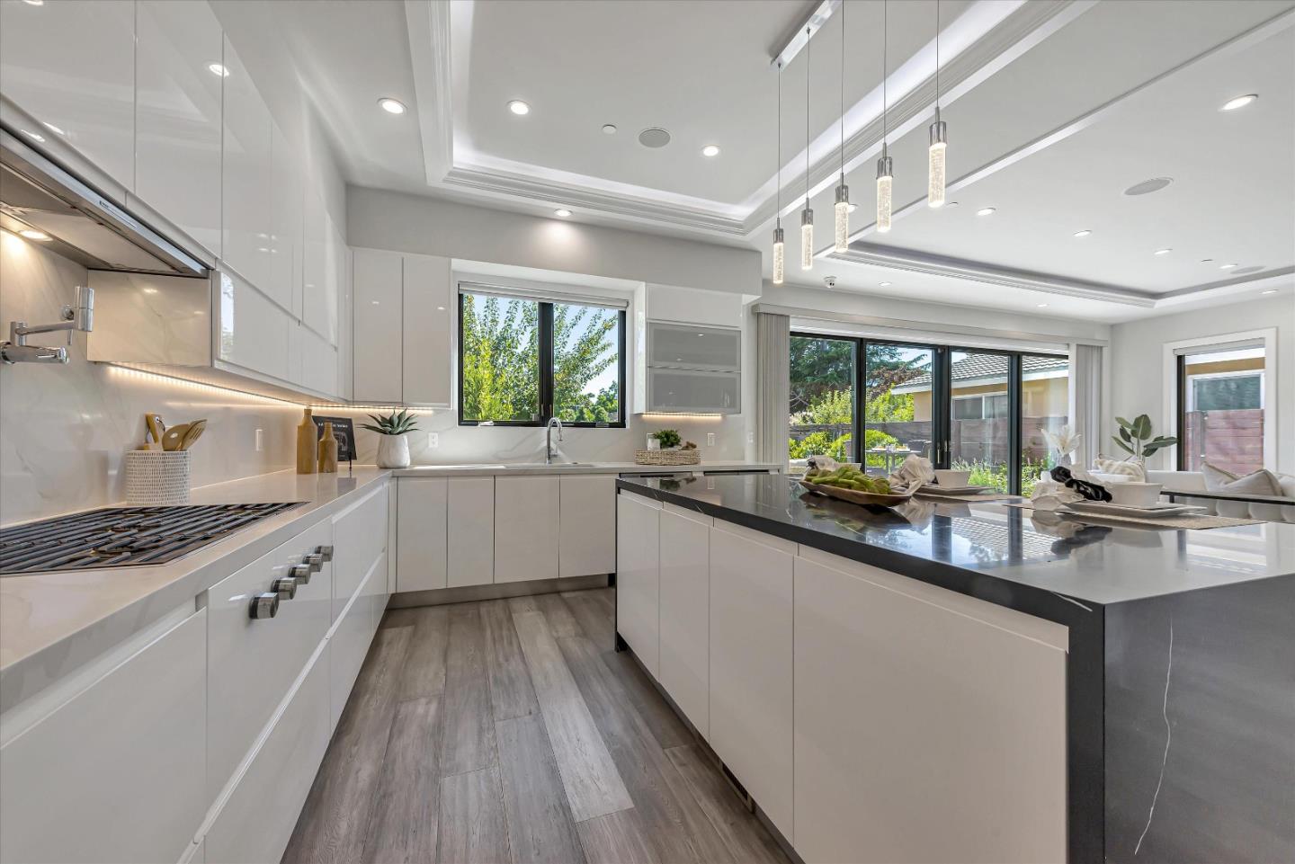 59 Devonshire Avenue Mountain View, CA 94043 - Photo 15 of 53 a large kitchen with stainless steel appliances granite countertop a lot of counter space and wooden floors