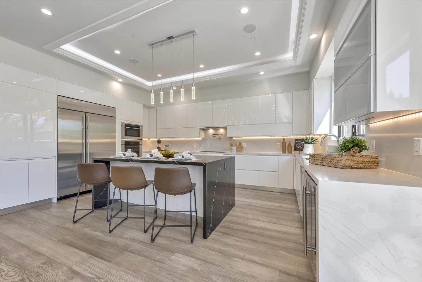 59 Devonshire Avenue Mountain View, CA 94043 - Photo 17 of 53 a kitchen with a table chairs refrigerator and cabinets