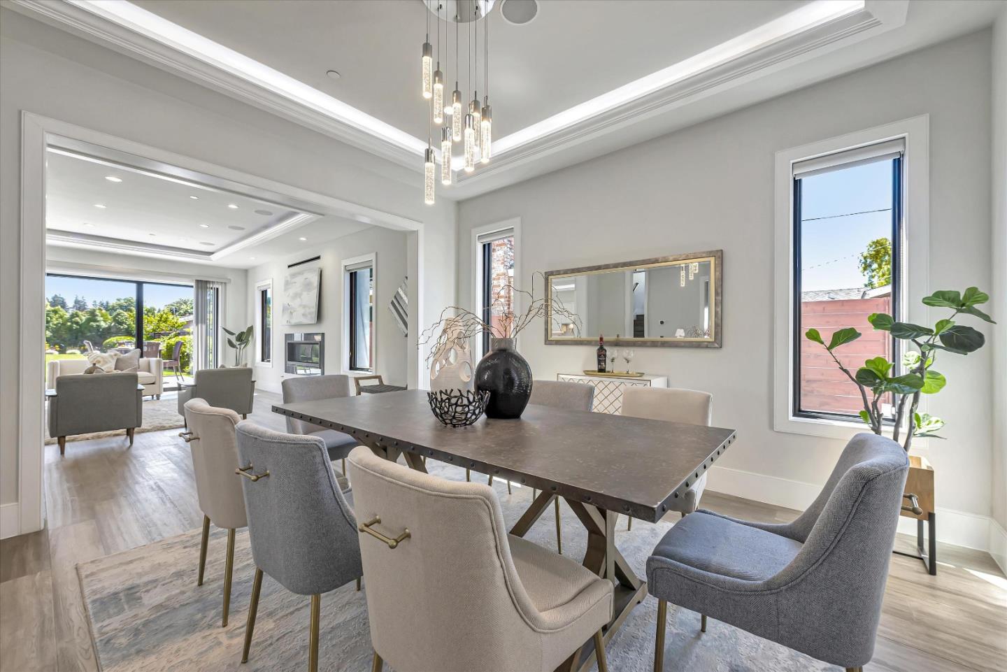 59 Devonshire Avenue Mountain View, CA 94043 - Photo 20 of 53 a view of a dining room with furniture a chandelier and wooden floor
