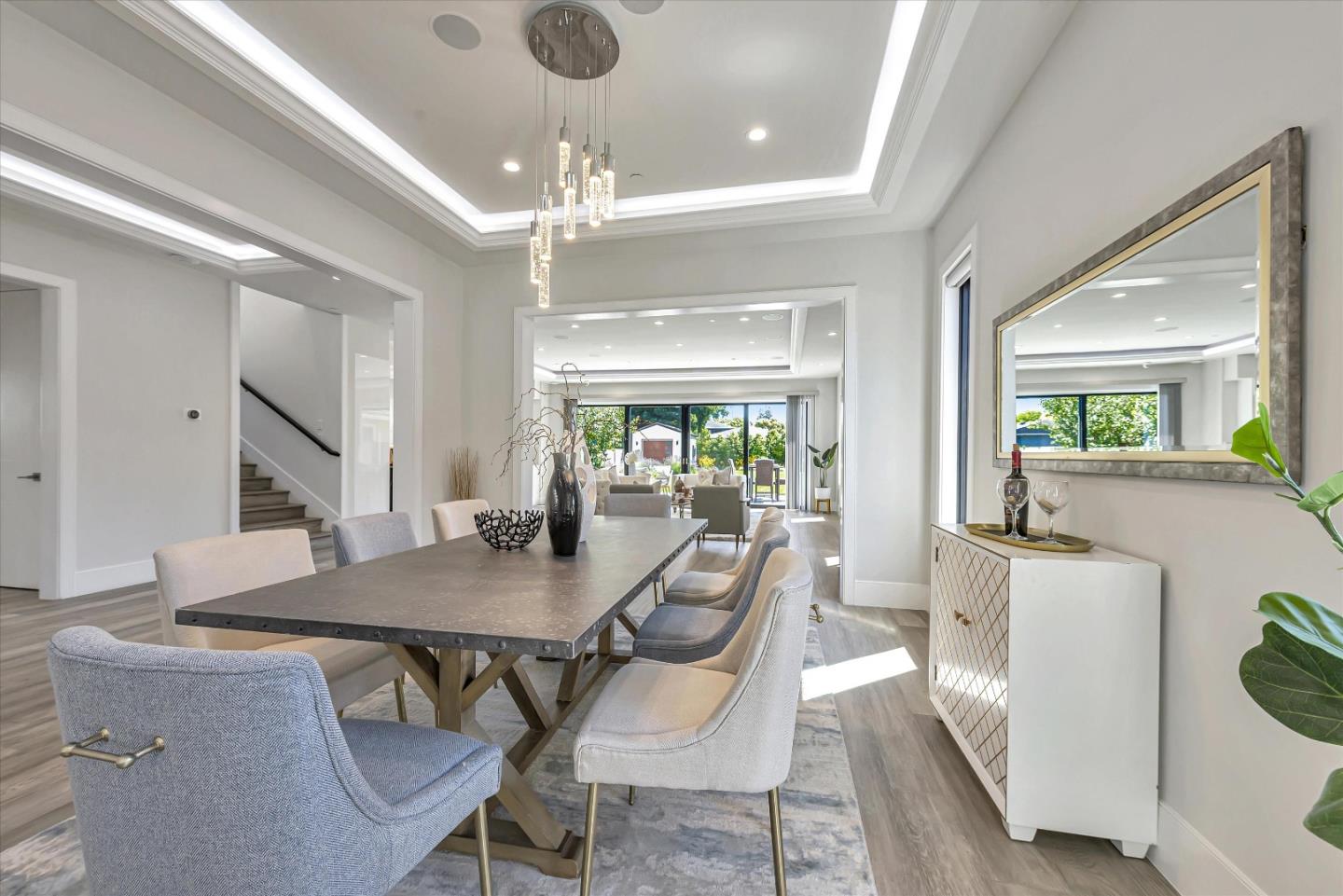 59 Devonshire Avenue Mountain View, CA 94043 - Photo 21 of 53 a view of a dining room with furniture a chandelier and wooden floor