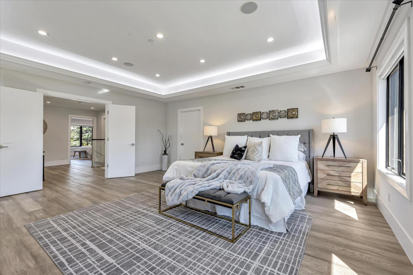 59 Devonshire Avenue Mountain View, CA 94043 - Photo 32 of 53 a spacious bedroom with a bed and wooden floor