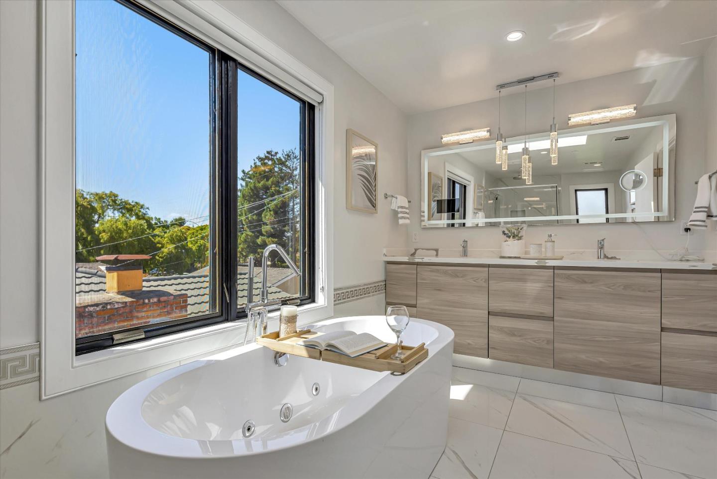 59 Devonshire Avenue Mountain View, CA 94043 - Photo 37 of 53 a bathroom with a granite countertop sink a mirror and a bathtub