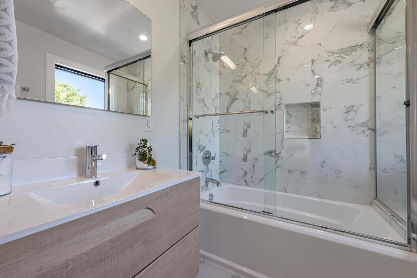 59 Devonshire Avenue Mountain View, CA 94043 - Photo 38 of 53 a bathroom with a bathtub and a shower