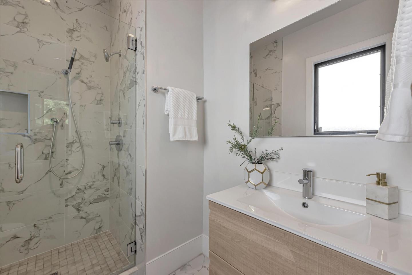 59 Devonshire Avenue Mountain View, CA 94043 - Photo 41 of 53 a bathroom with a sink a vanity and a mirror