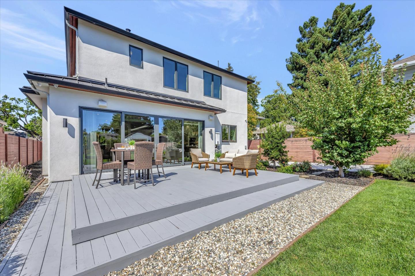 59 Devonshire Avenue Mountain View, CA 94043 - Photo 47 of 53 a view of a house with backyard sitting area and garden