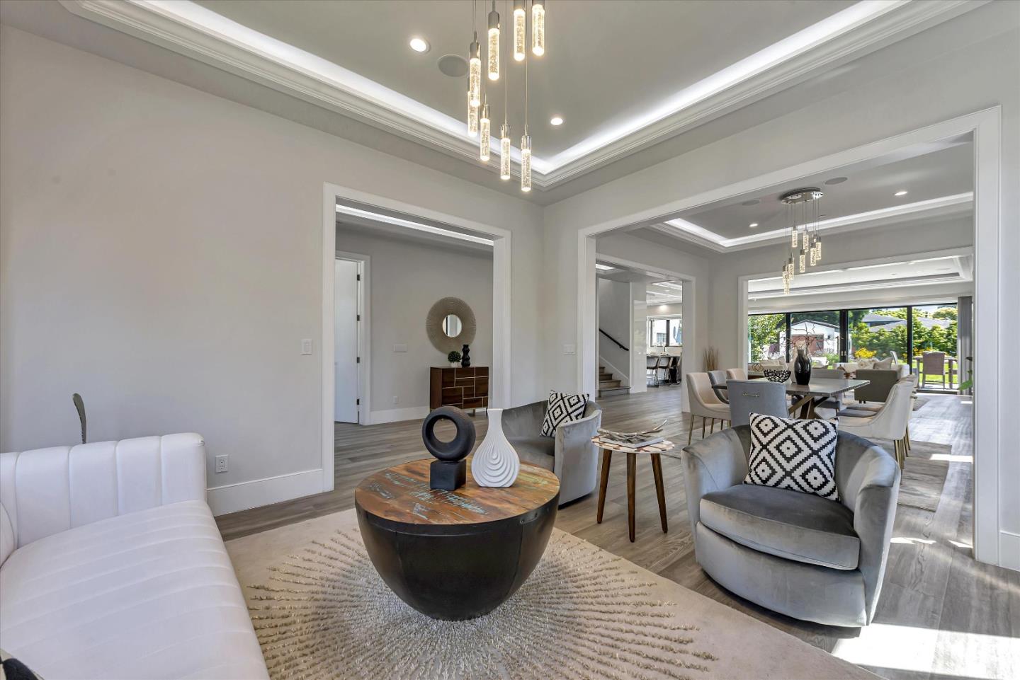 59 Devonshire Avenue Mountain View, CA 94043 - Photo 9 of 53 a living room with furniture and a chandelier