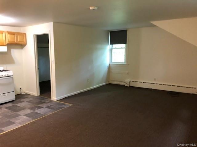 49 Congers Road, Unit 7 New City, NY 10956 - Photo 5 of 11 View of living room and kitchen looking towards the bedroom