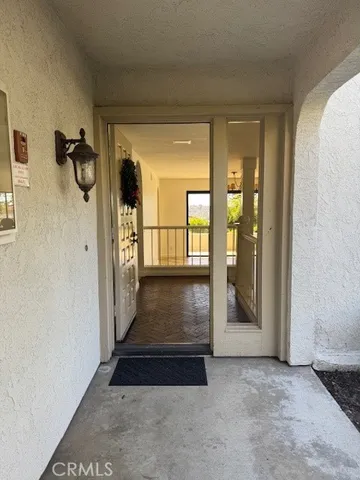 a view of a hallway view with staircase