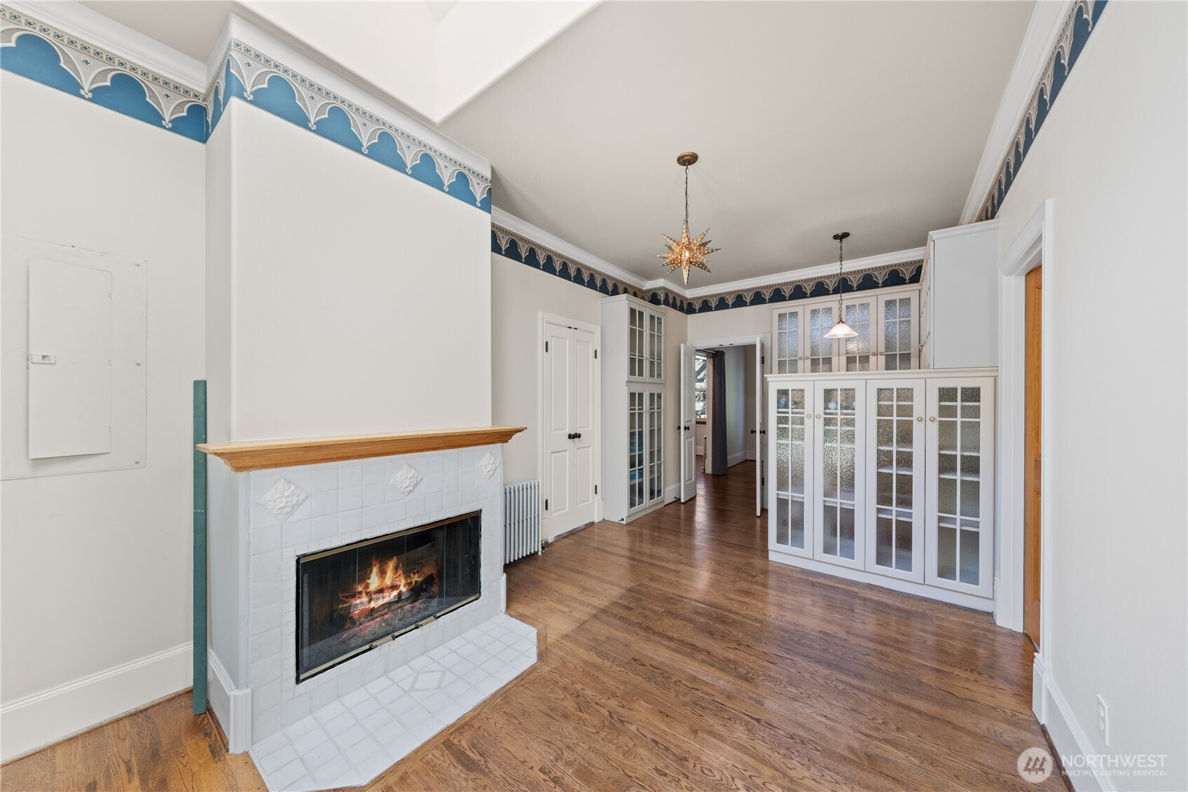 5513 Homestead Lane Anacortes, WA 98221 - Photo 20 of 37 a view of livingroom with fireplace wooden floor and window