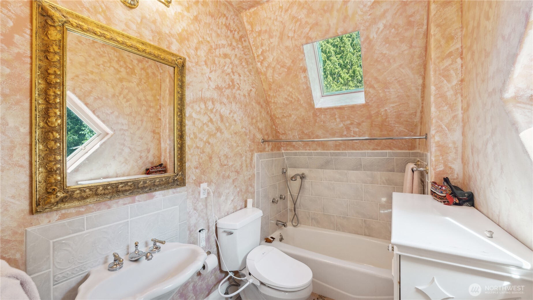 5513 Homestead Lane Anacortes, WA 98221 - Photo 27 of 37 a bathroom with a bathtub and sink