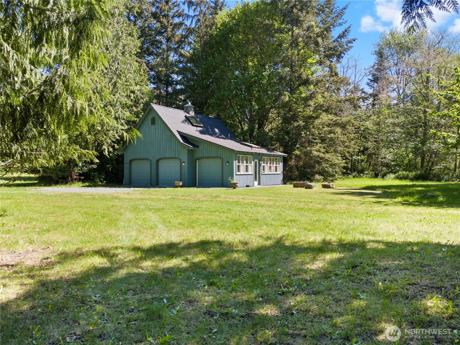 5513 Homestead Lane Anacortes, WA 98221 - Photo 30 of 37 a front view of house with yard and green space