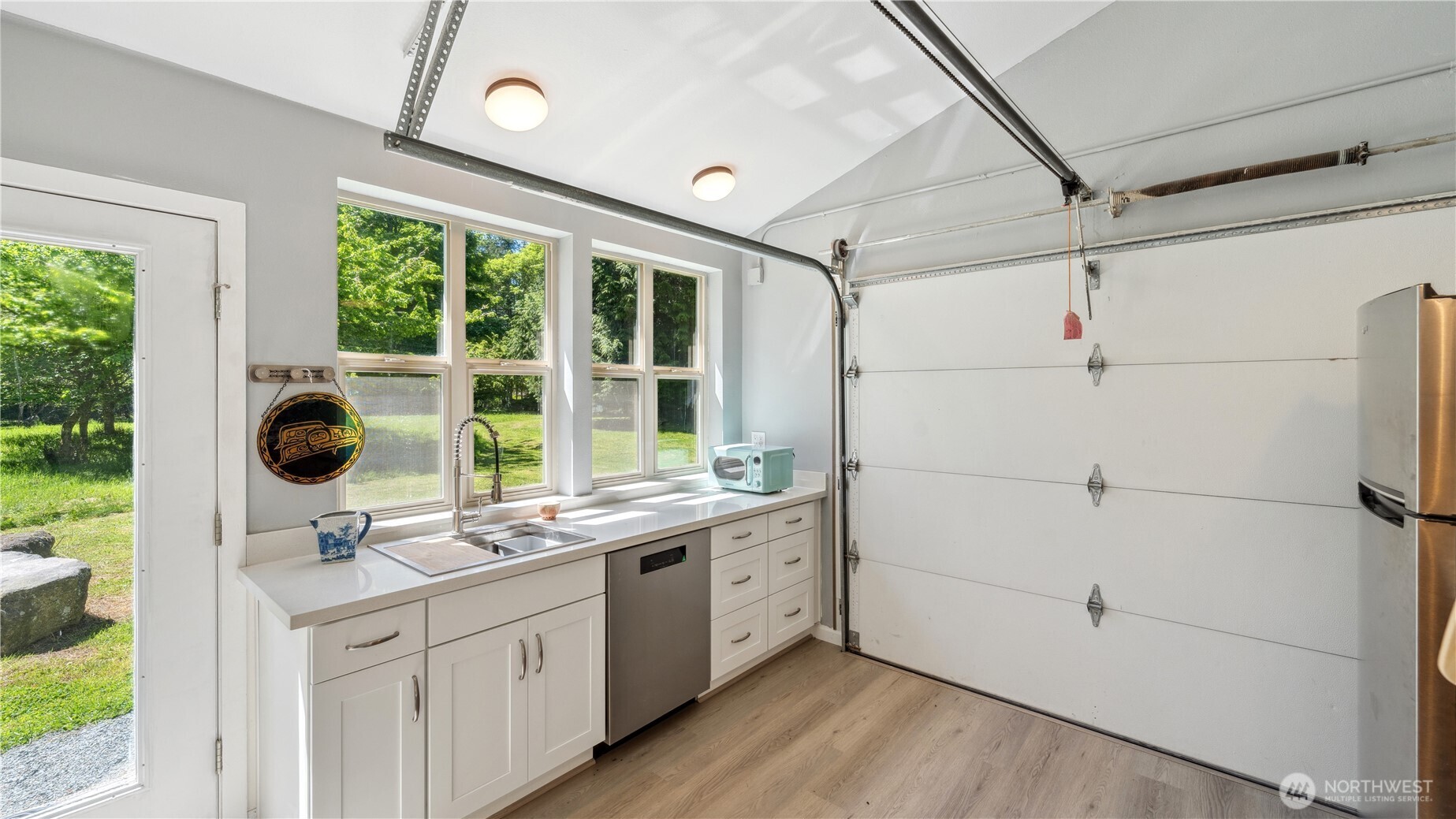 5513 Homestead Lane Anacortes, WA 98221 - Photo 31 of 37 a kitchen with a sink and a window