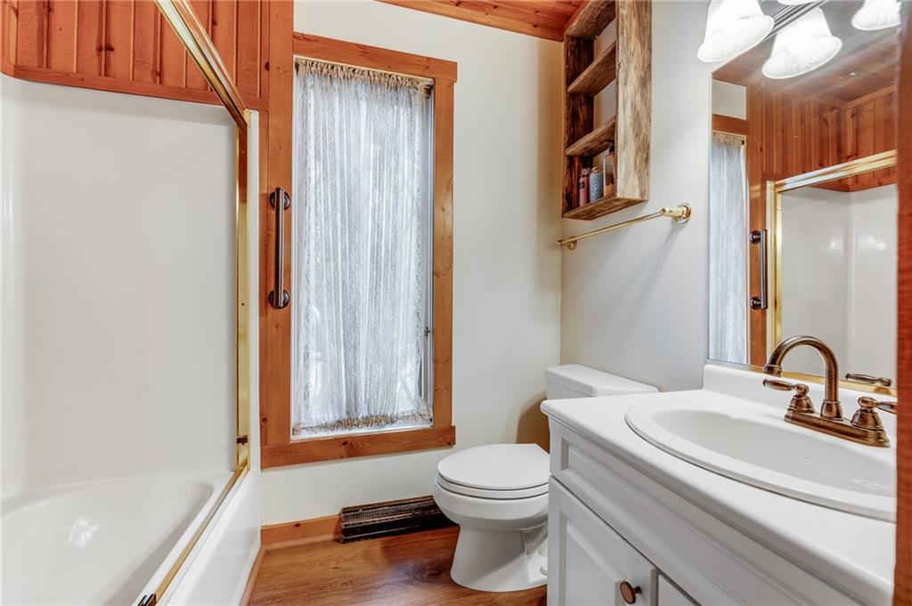 2162 Garards Fort Road Waynesburg, PA 15370 - Photo 16 of 50 a bathroom with a sink a toilet and shower