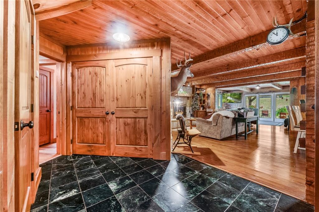 2162 Garards Fort Road Waynesburg, PA 15370 - Photo 18 of 50 a living room with lots of furniture and a rug