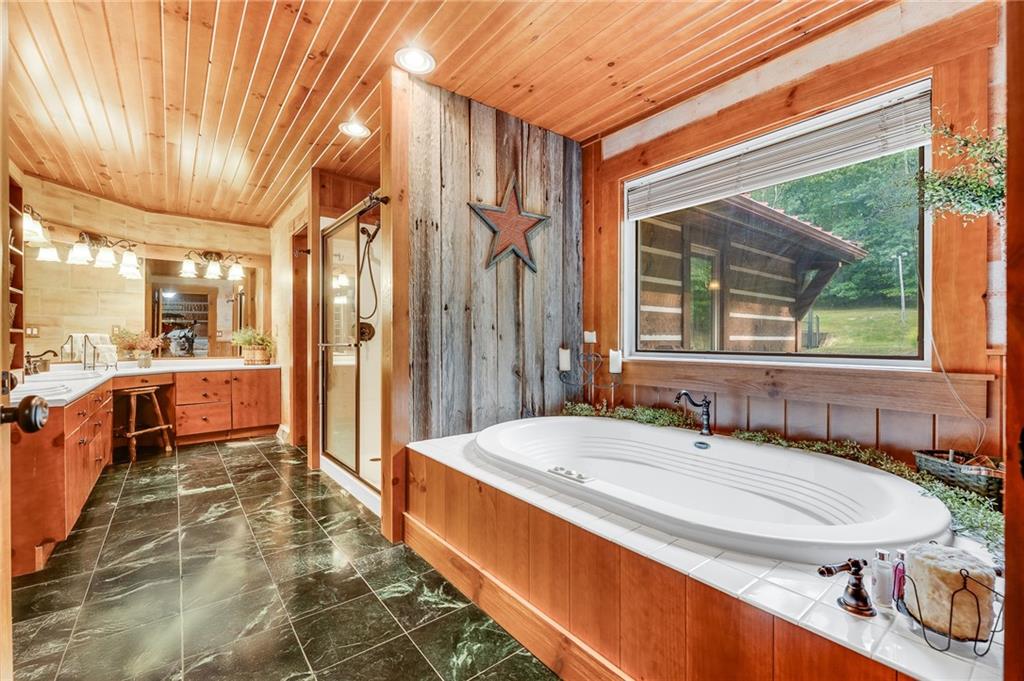 2162 Garards Fort Road Waynesburg, PA 15370 - Photo 2 of 50 a spacious bathroom with a tub and sink