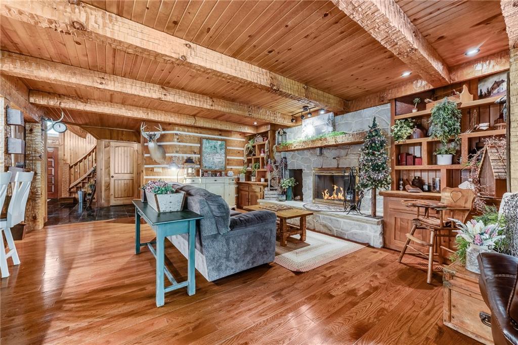 2162 Garards Fort Road Waynesburg, PA 15370 - Photo 21 of 50 a living room with lots of furniture and a fireplace