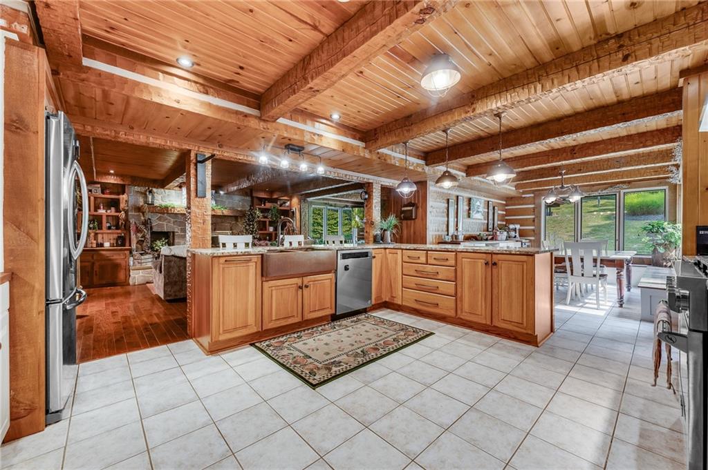 2162 Garards Fort Road Waynesburg, PA 15370 - Photo 27 of 50 a open kitchen with cabinets a sink and appliances