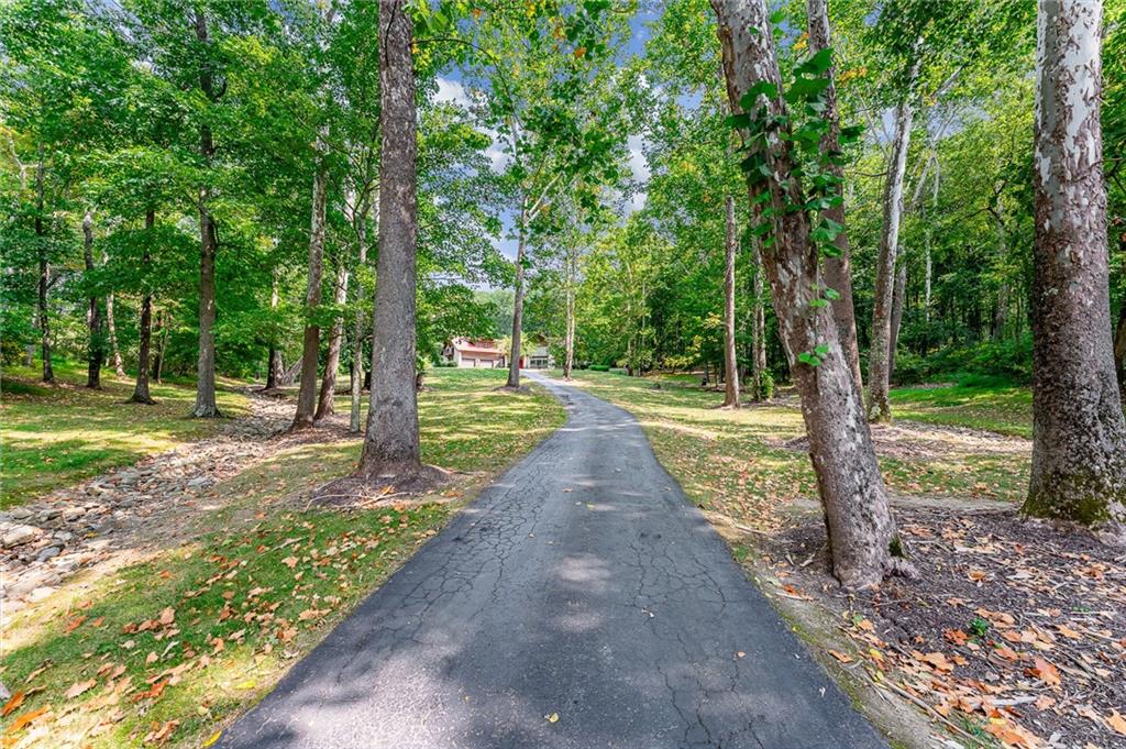 2162 Garards Fort Road Waynesburg, PA 15370 - Photo 35 of 50 a front view of a house with a yard