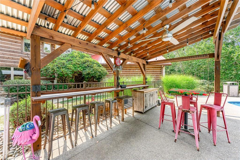 2162 Garards Fort Road Waynesburg, PA 15370 - Photo 47 of 50 a view of porch with a table and chairs