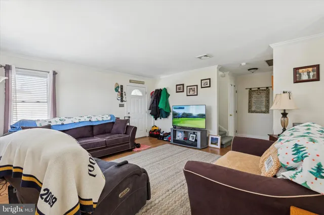 a room with a sink and a mirror