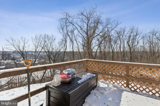 a view of a livingroom with furniture and a table