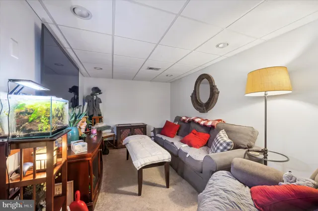 a view of a house with wooden fence