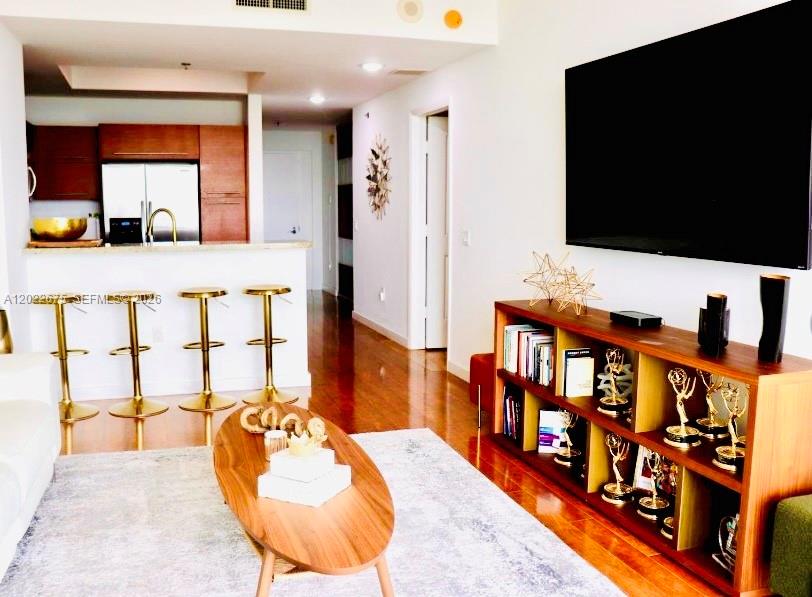 2681 North Flamingo Road, Unit 2602S Sunrise, FL 33323 - Photo 5 of 18 swimming pool view with a flat screen tv