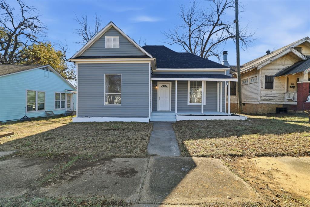 604 East Morton Street Denison, TX 75021 - Photo 1 of 22 a front view of a house with a yard and garage