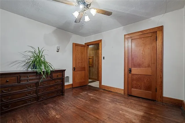 wooden floor and closet in a room