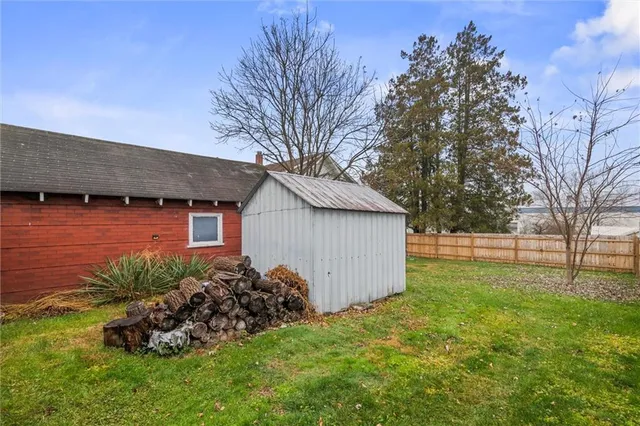 a backyard of a house with lots of green space