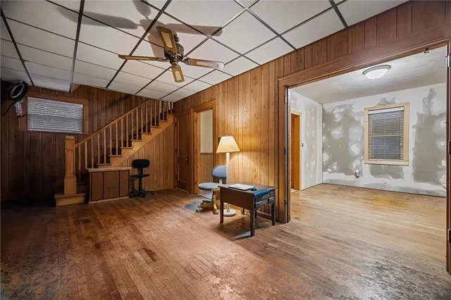 a view of a livingroom with furniture and a fireplace