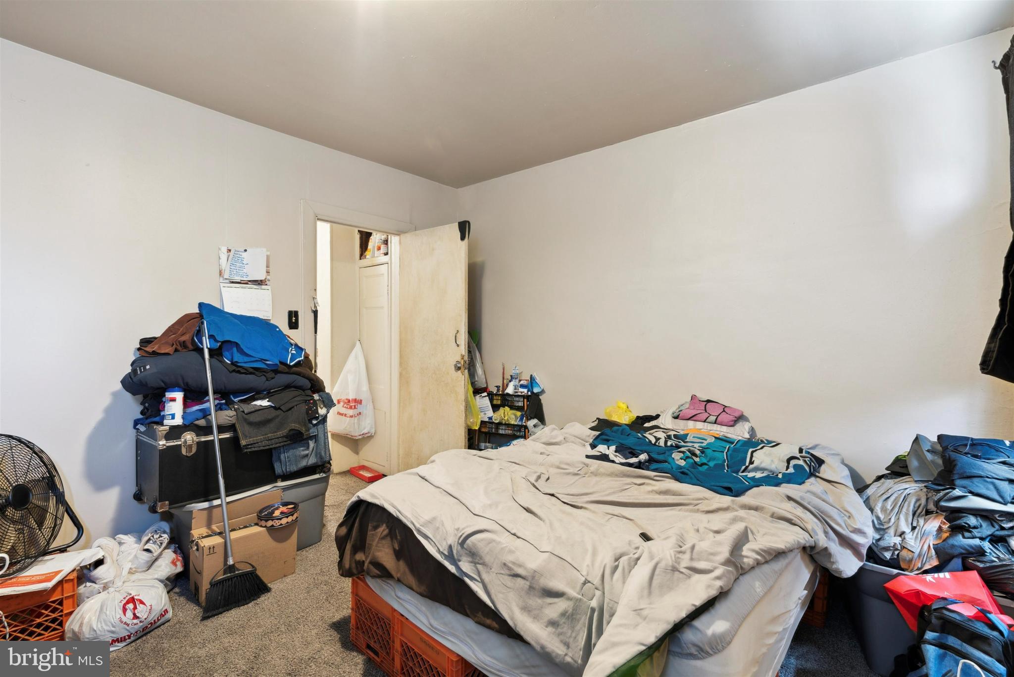 6124 Upland Street Philadelphia, PA 19142 - Photo 14 of 15 a bedroom with a bed and a desk
