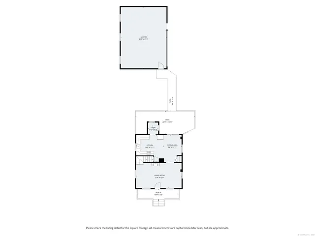 a black and white photo of a bench