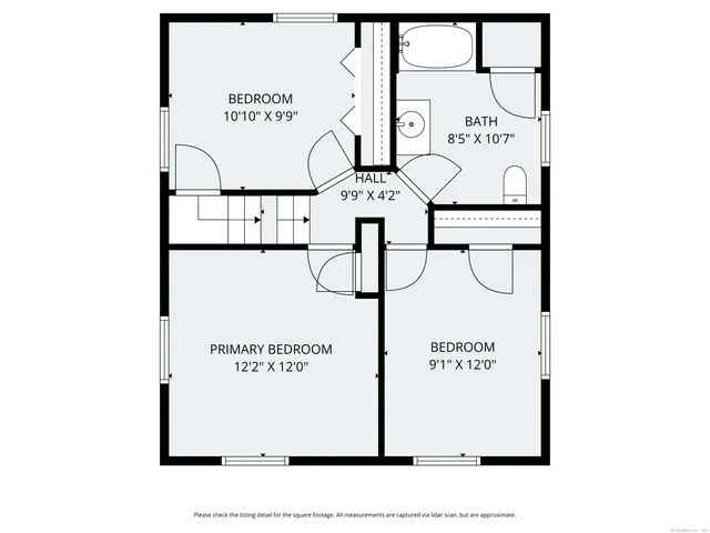 a picture of a bench in front of a wall