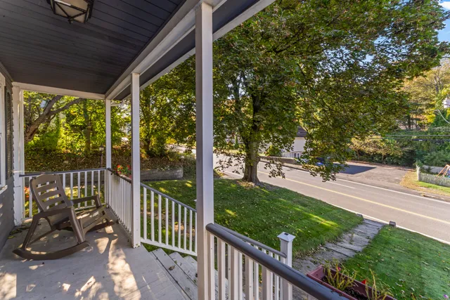 a view of a porch with a yard