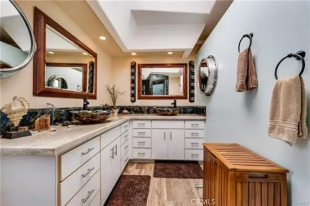 a view of a patio with table and chairs potted plants