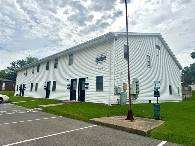 a house view with a garden space