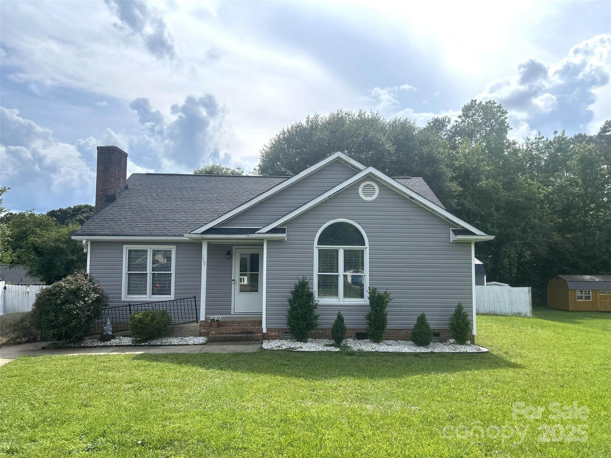 110 Weeping Willow Way Gastonia, NC 28052 - Photo 1 of 28 a front view of a house with a yard