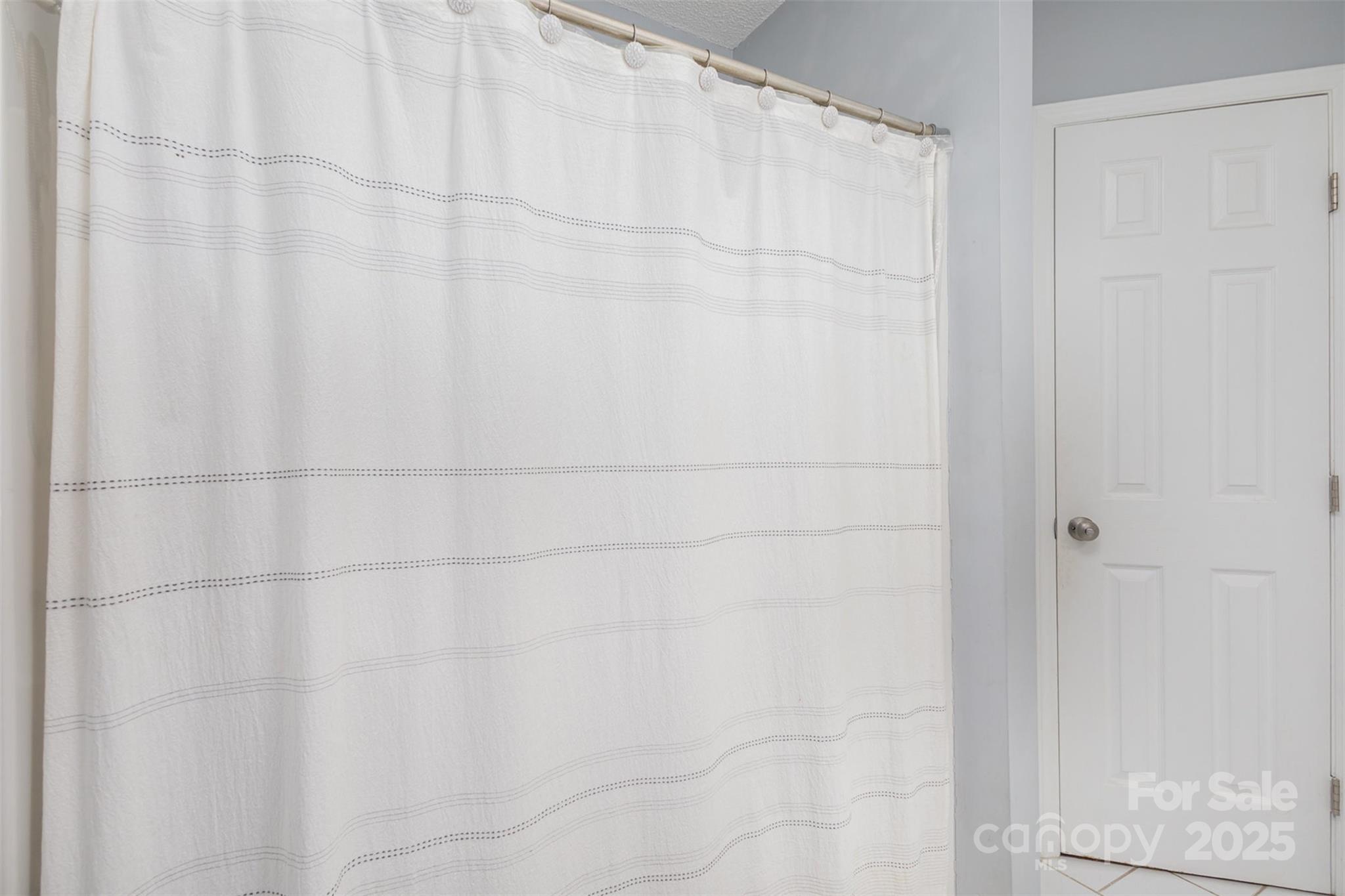 110 Weeping Willow Way Gastonia, NC 28052 - Photo 22 of 28 a bathroom with a shower curtain