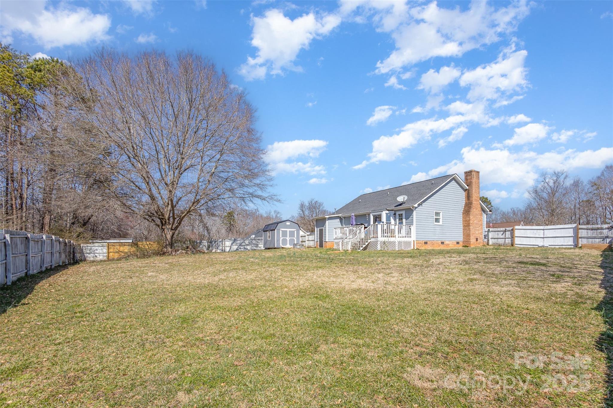 110 Weeping Willow Way Gastonia, NC 28052 - Photo 27 of 28 a big house with a big yard and large trees